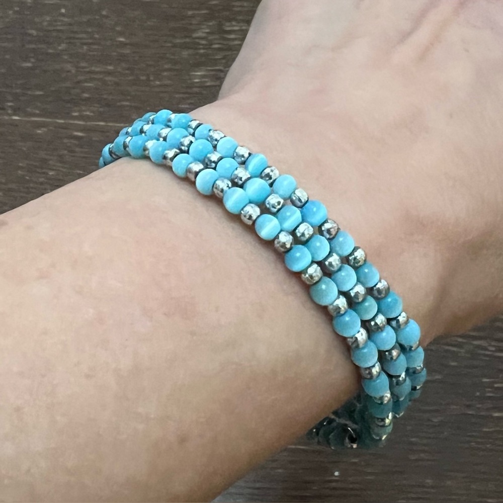 Pretty, handmade silver wire and blue bead bracelet